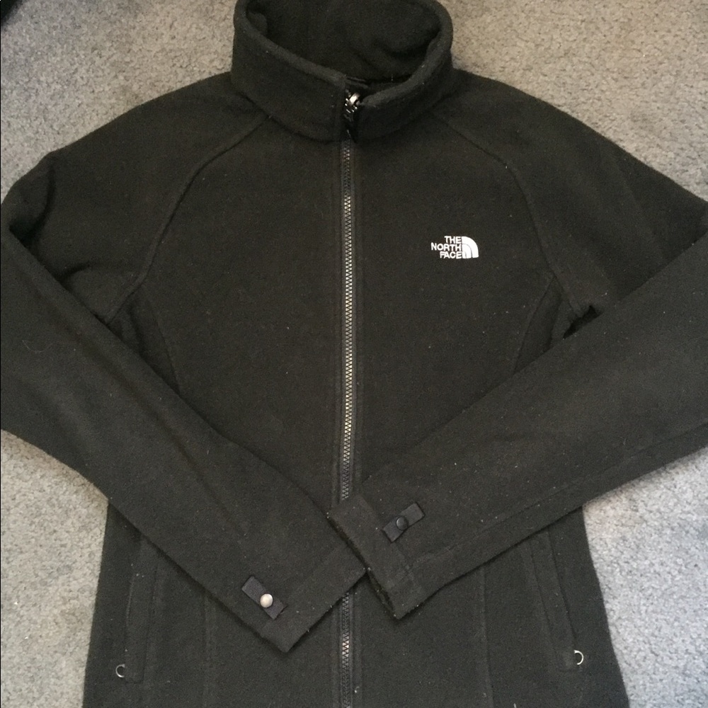 Black woman's light north face jacket
